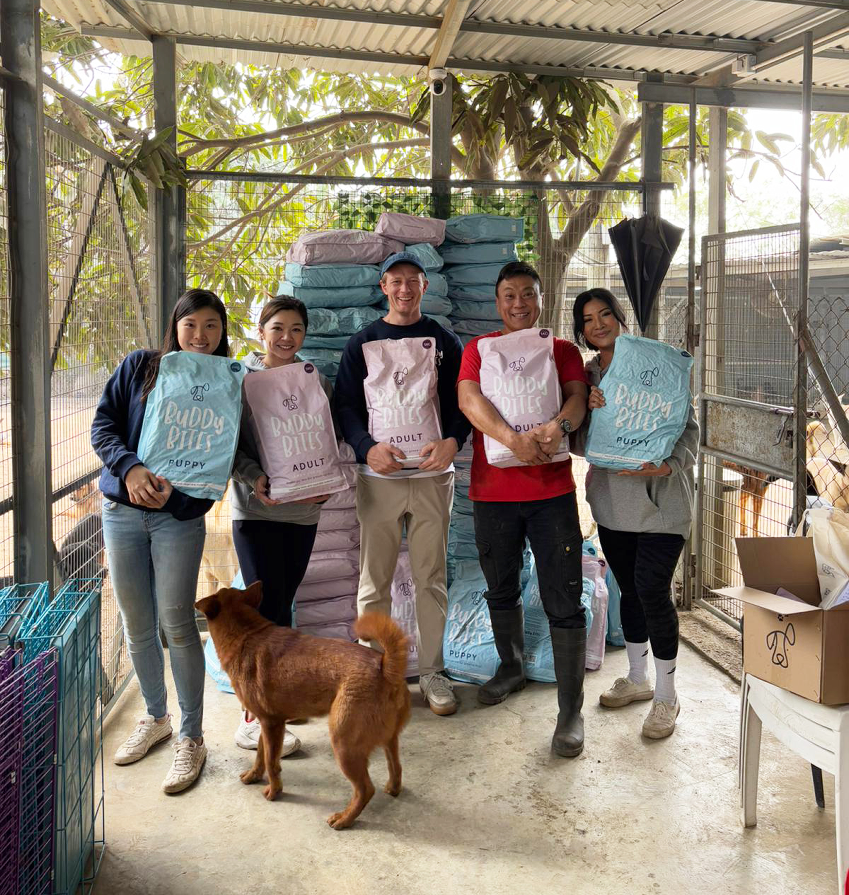 The Buddy Bites team delivering food to a Hong Kong shelter